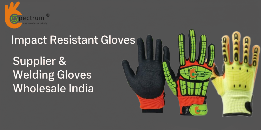Impact resistant gloves and welding gloves displayed in industrial setting – Spectrum Technicals, leading safety gloves supplier in India